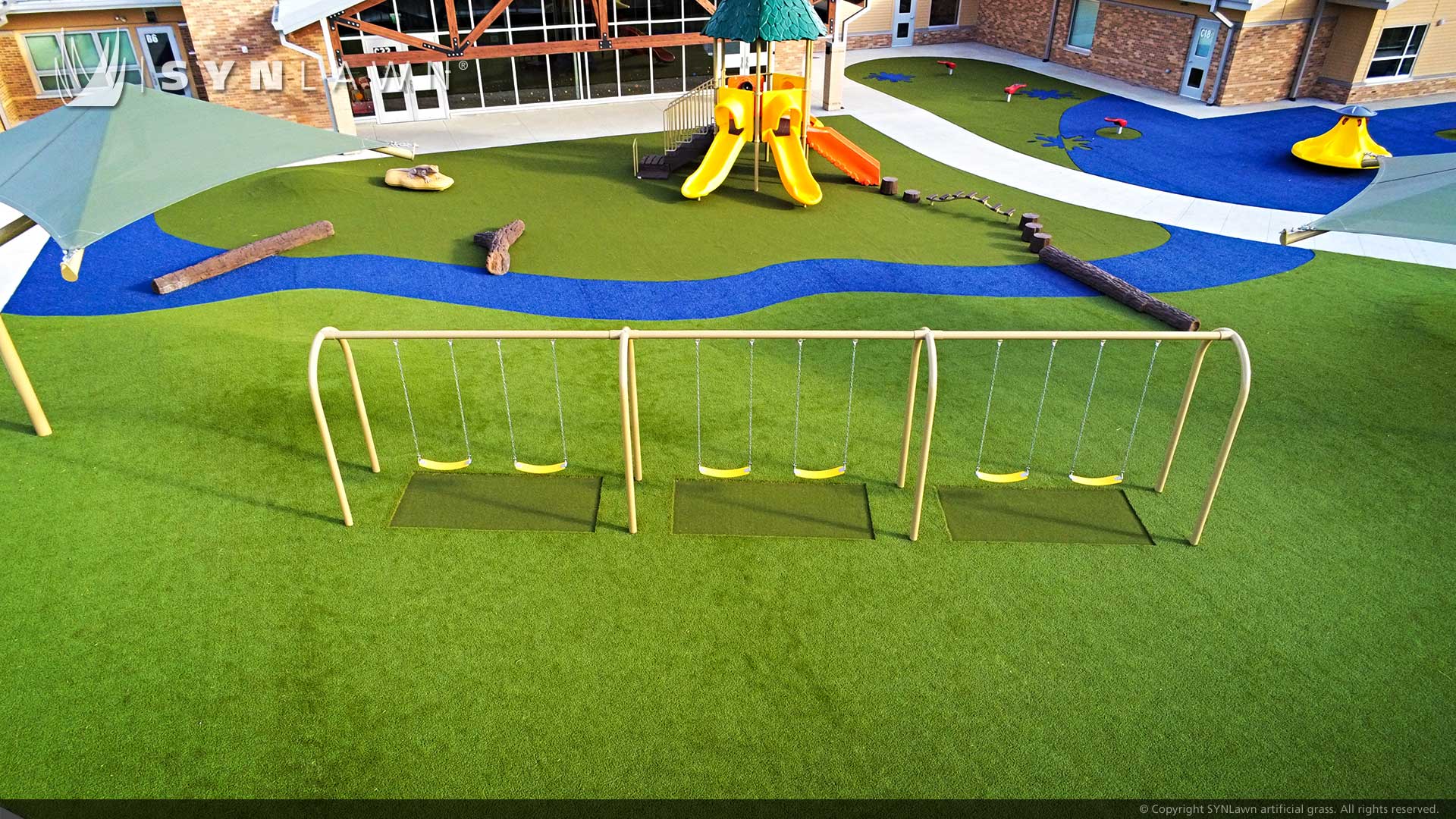 image of synlawn artificial grass at liggett trails early education center featuring colored artificial turf