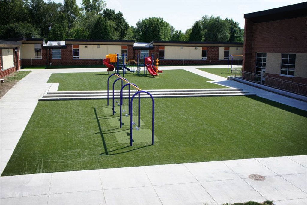 image of thomas ultican elementary playground with swing set and slide