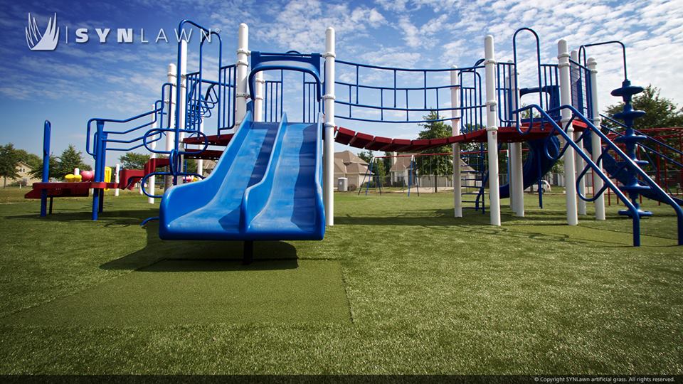 image of voy spears jr elementary playground with a blue slide