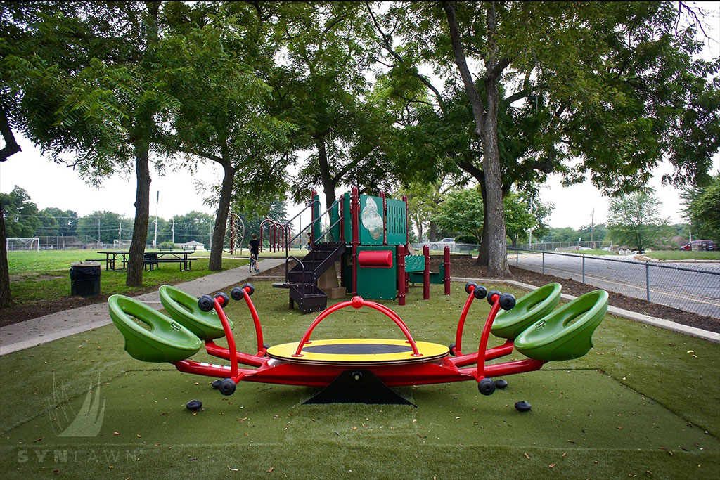 image of lee’s summit playground climbing equipment on artificial grass