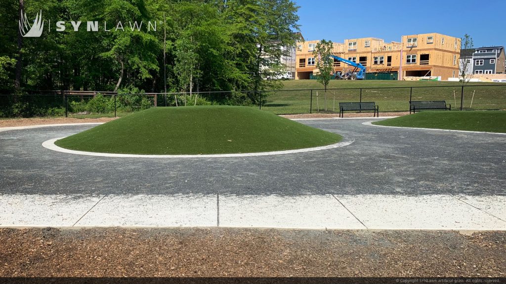 image of artificial pet grass at Greenleigh crossroads dog park Baltimore Maryland