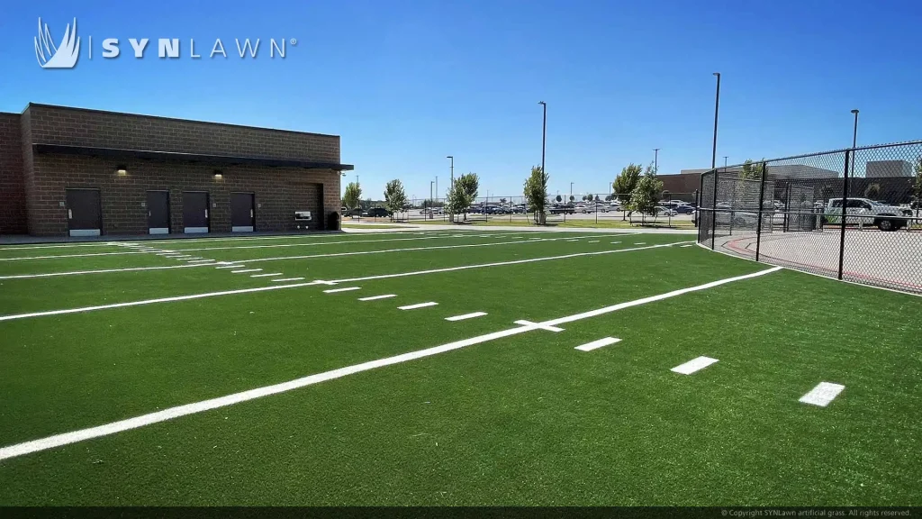 image of SYNLawn artificial grass at Ray Braswell High School Custom Inlaid Logo and Practice Field for Recreation and Multi-Use