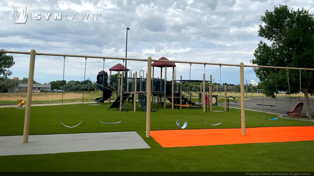 image of SYNLawn artificial grass for playgrounds in Green Orange and Gray colors at Newcastle Elementary Wyoming