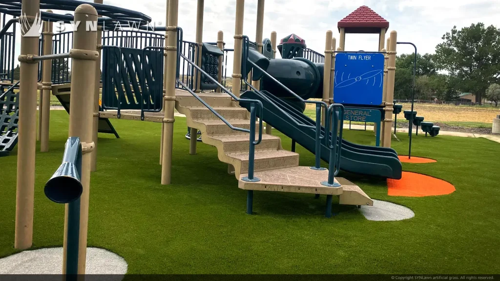 image of SYNLawn artificial grass for playgrounds in Green Orange and Gray colors at Newcastle Elementary Wyoming