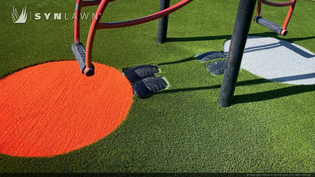 image of SYNLawn artificial grass for playgrounds in Green Orange and Gray colors at Newcastle Elementary Wyoming