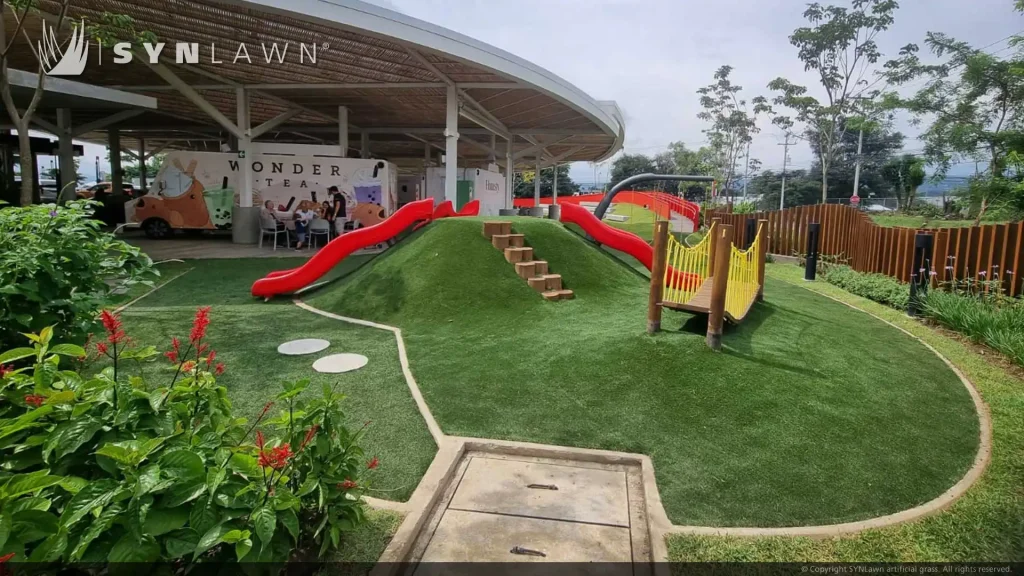 image of synlawn kid safe artificial playground grass at cityzen costa rica commercial park