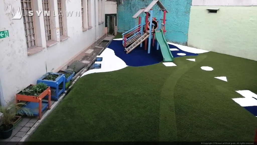 image of SYNLawn child safe artificial grass playground at Escuela Justo Antonio Facio Public School Costa Rica