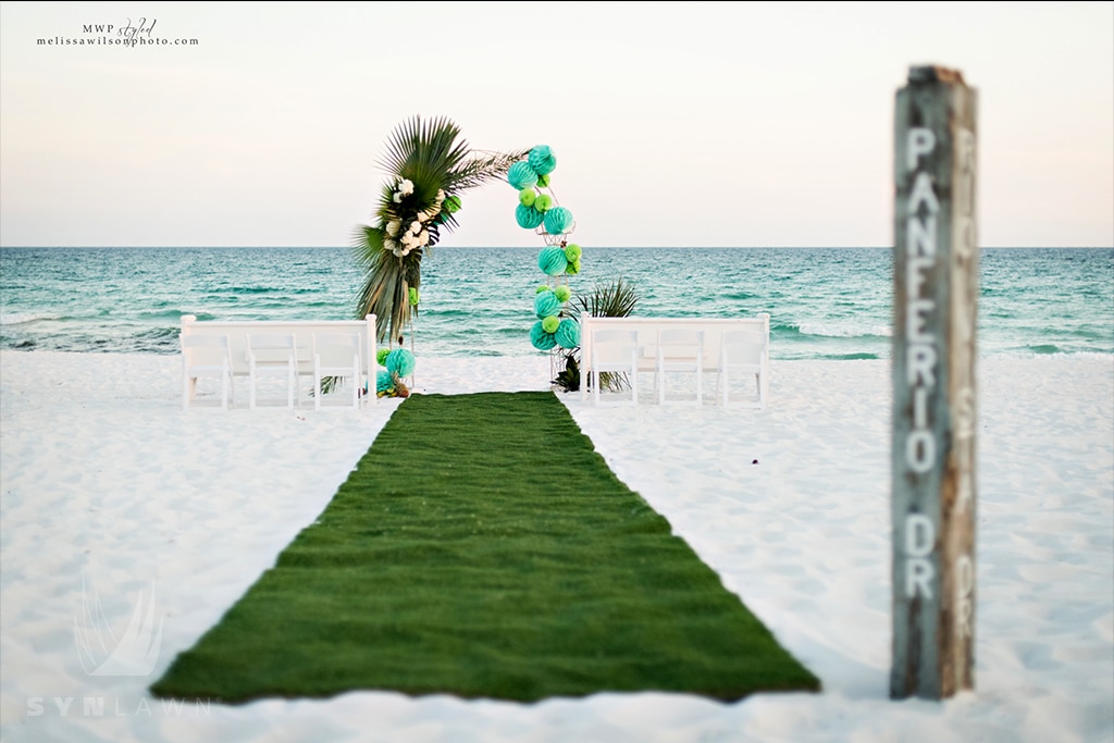 image of beach ceremony photo shoot with artificial grass aisle runner