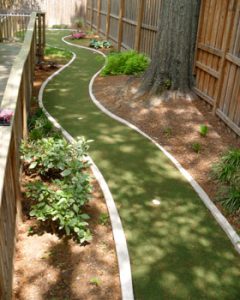 image of maria teresa babies house featuring synlawn play area system