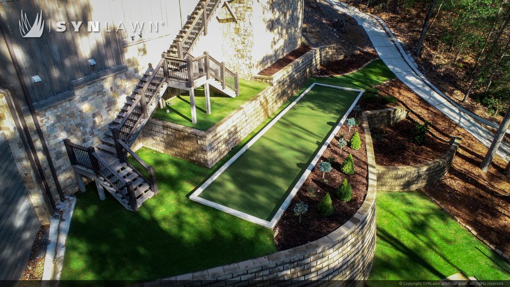 image of SYNLawn artificial grass at luxurious vacation home located in the Mountains of North Georgia with Basketball Tennis Pickelball Bocce Courts Archery Range and more