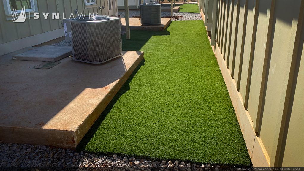 image of SYNLawn artificial grass at the Cottages at Old Monrovia in Huntsville Alabama a multi unit single family residential community