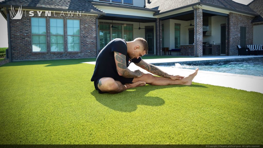 image of syn lawn artificial grass teams up with UFC Lightweight Champion Dustin the Diamond Poirier to give away a signed box of his signature Louisiana Style Hot Sauce