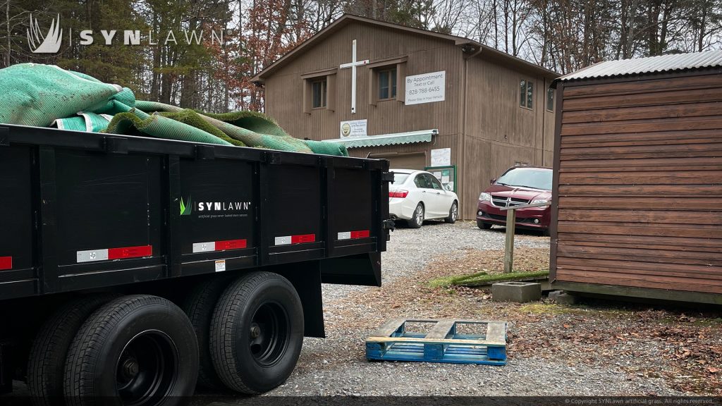 image of Scott and Marie Marks of SYNLawn Carolinas / Southeast Turf donate to the Living Waters Lutheran Church in Cherokee North Carolina