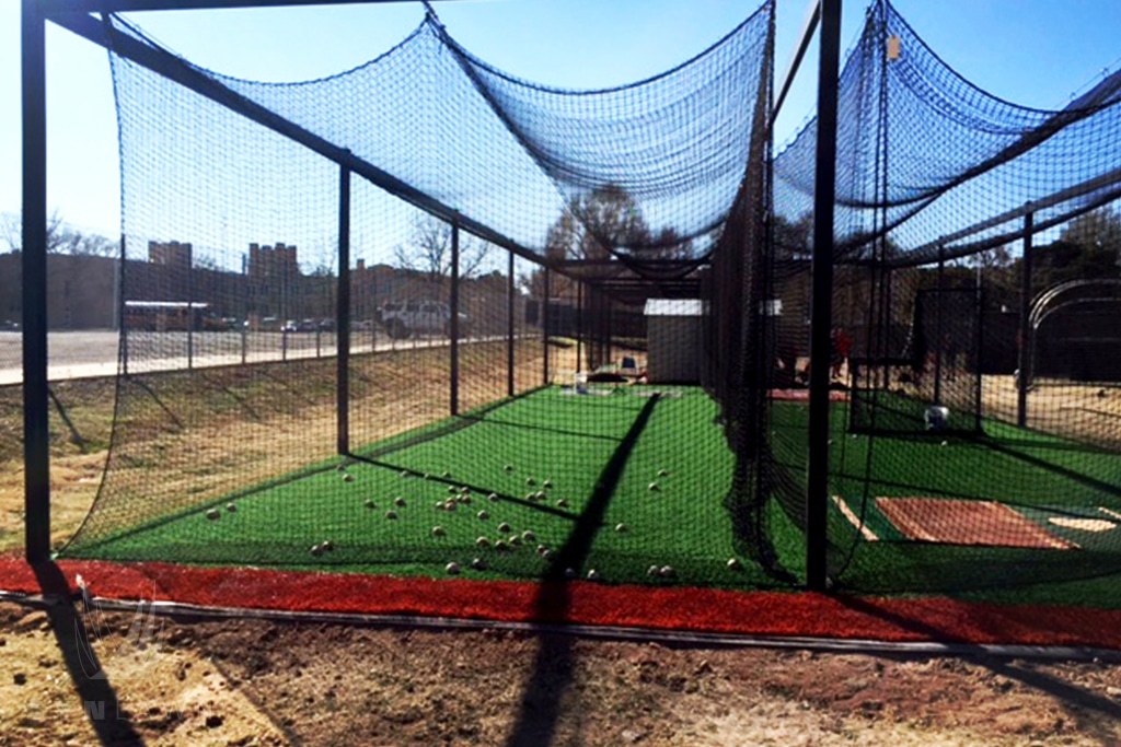 image of batting cages Roswell baseball field with fake turf