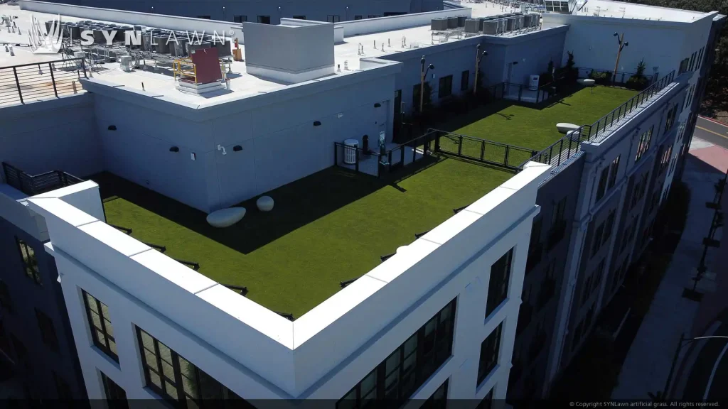 image of SYNLawn artificial grass on the roof deck urban patio of the Waymark luxurious mixed-use development complex in the East Bay