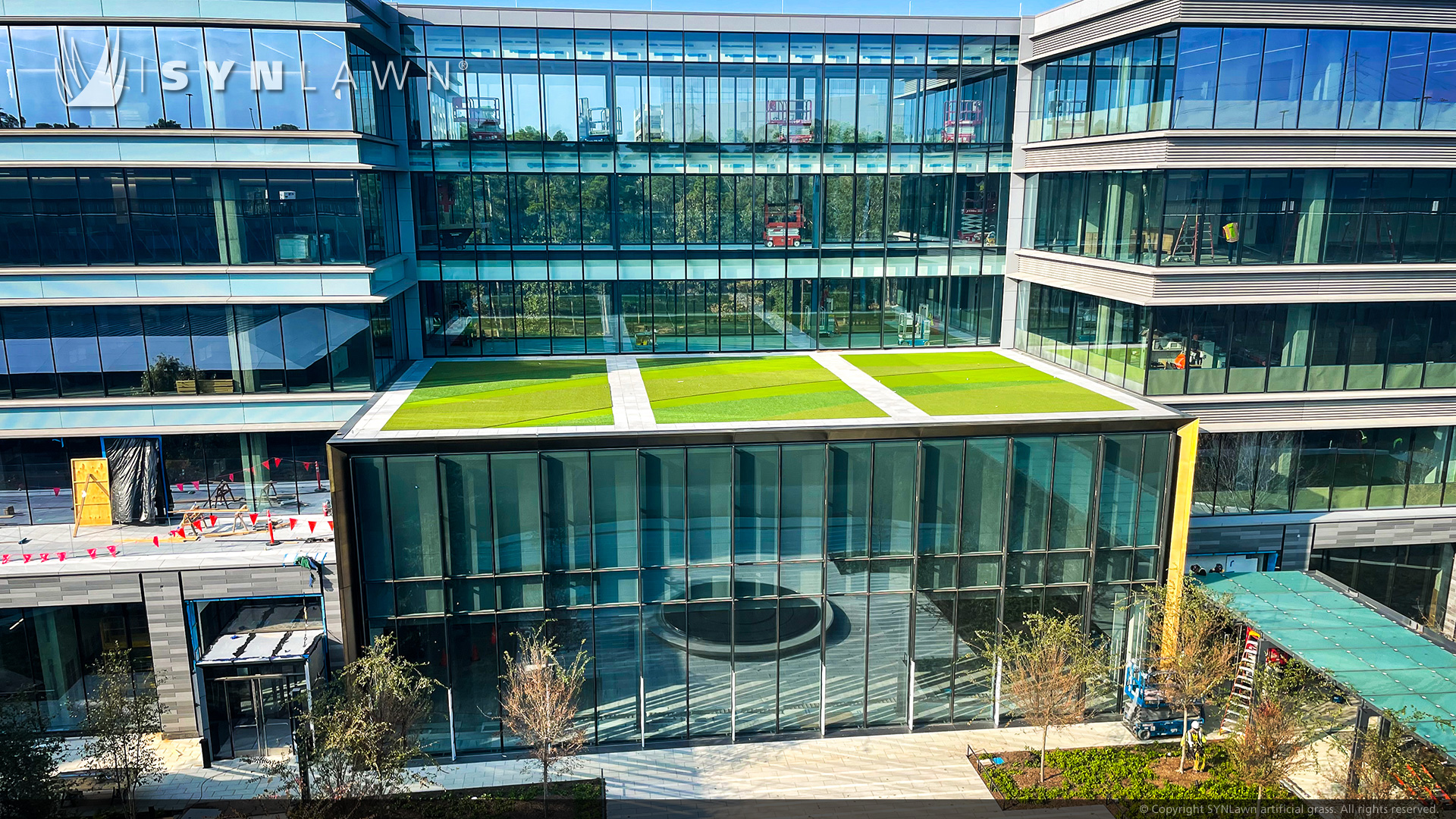 Hewlett Packard aggiunge il design personalizzato del tappeto erboso intarsiato al campus di Houston