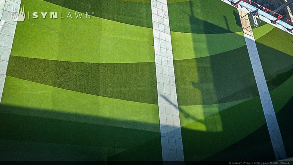 image of synlawn artificial grass custom inlaid turf design roof top at hewlett packard campus offices in Houston Texas