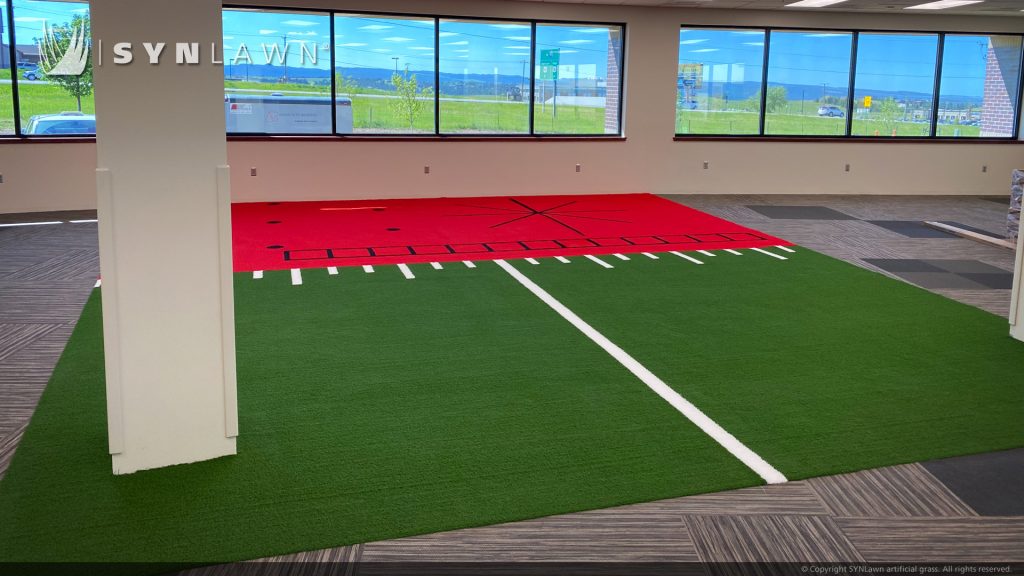 image of SYNLawn Custom Inlaid Turf Design using artificial grass for physical therapy at Black Hills Orthopedic and Spine Center Rapid City South Dakota