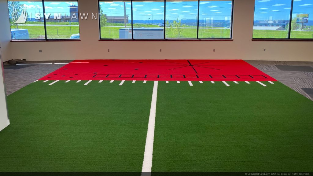 image of SYNLawn Custom Inlaid Turf Design using artificial grass for physical therapy at Black Hills Orthopedic and Spine Center Rapid City South Dakota