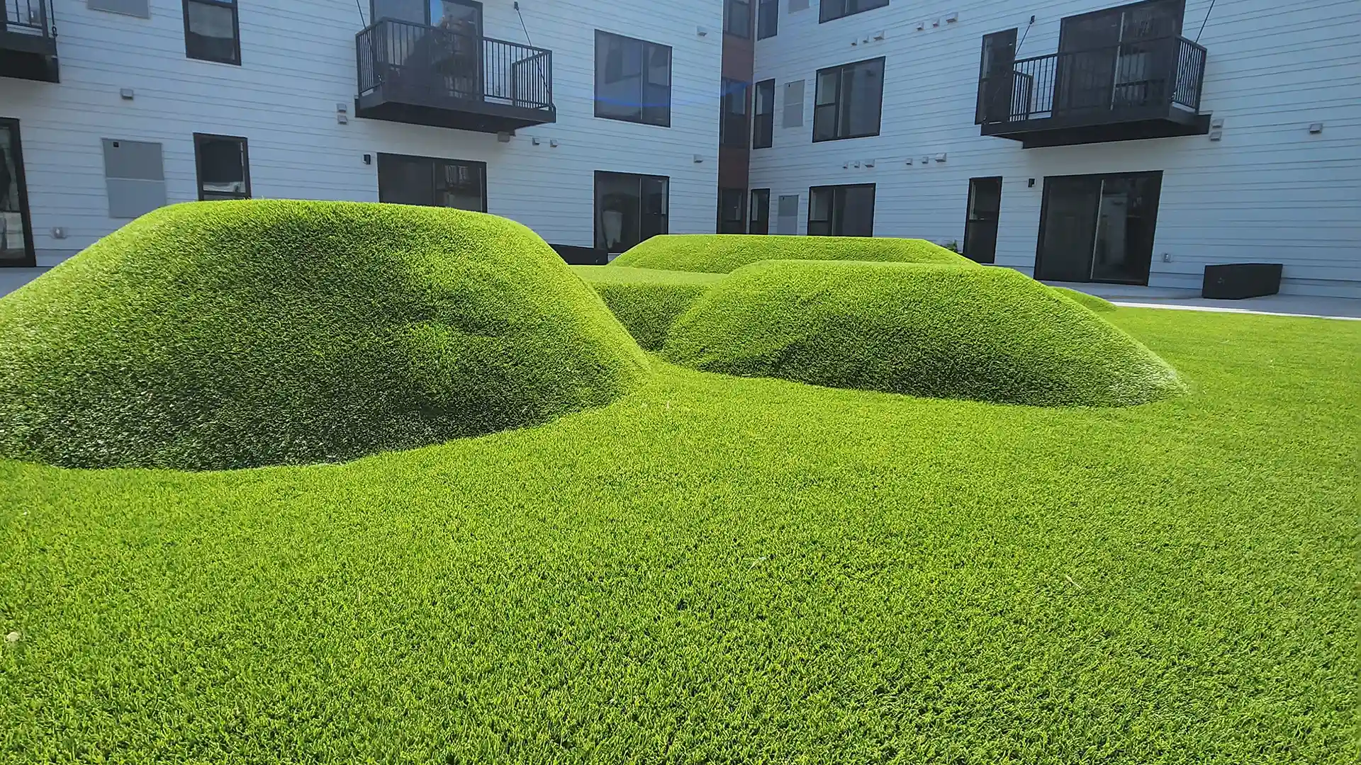 image of synthetic grass mounds at Currie Commons Minnesota
