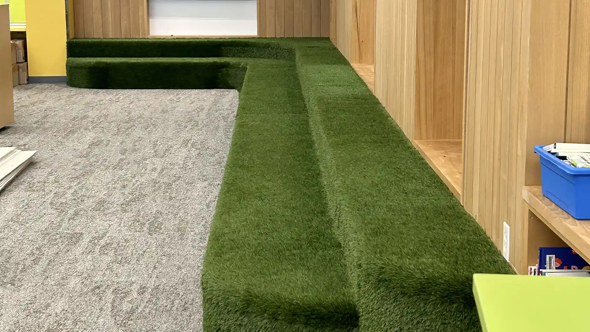 image of synthetic grass installation at ECISD Library reading nook in San Antonio Texas