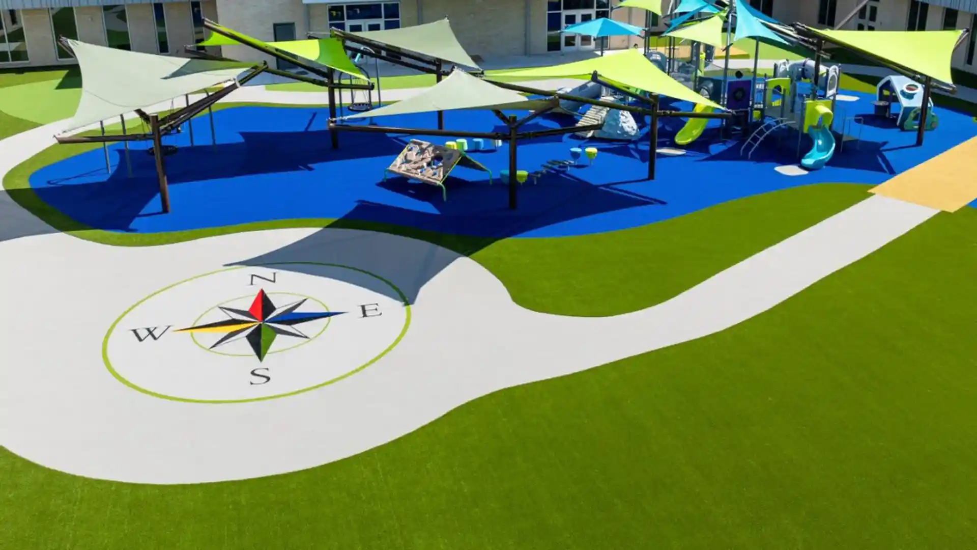 Custom logo fabricated using multiple colors of artificial playground grass by SYNLawn at Texas school playground image of custom logo fabricated from multiple colors of artificial grass by SYNLawn at Texas school playground