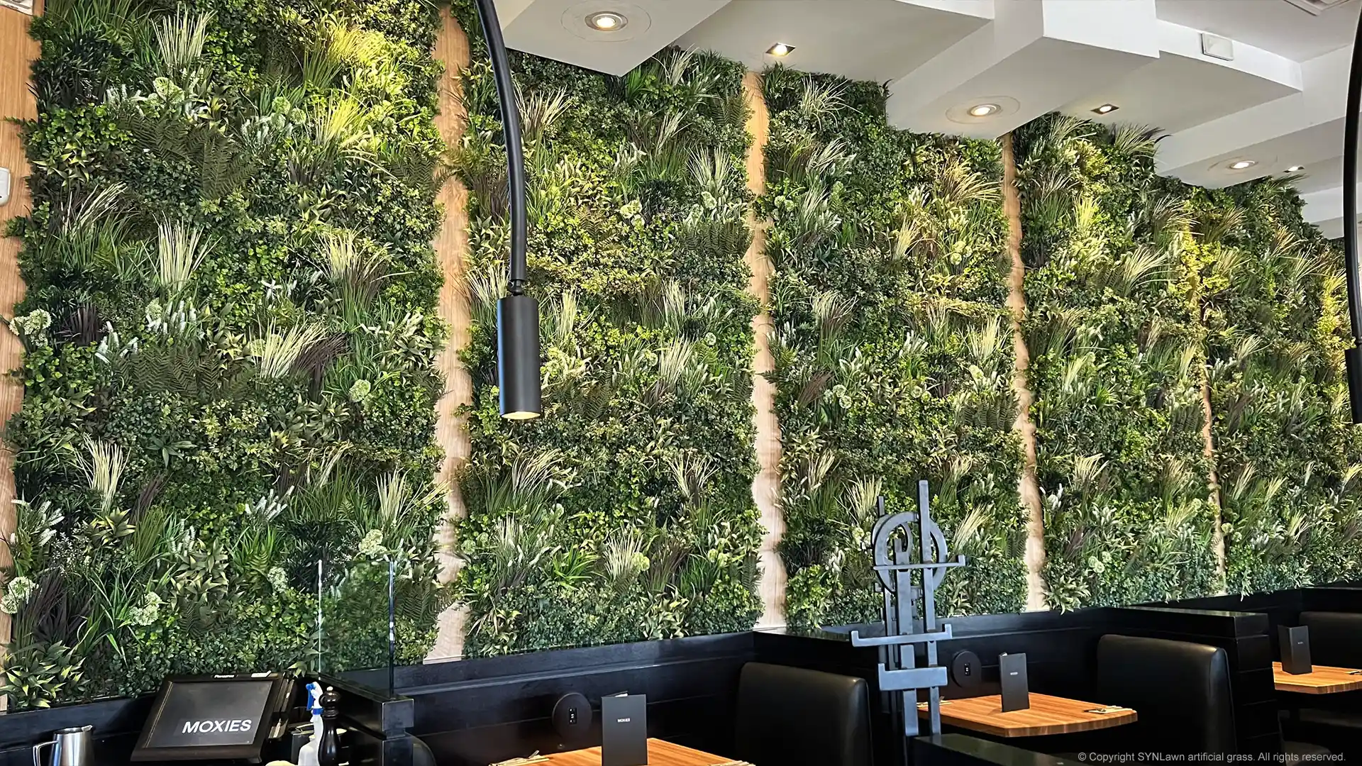 Calico Greens Faux Living Green Wall Decor at Moxies Restaurant by SYNLawn in Toronto Ontario image of calico green faux living green wall decor at moxies restaurant in toronto ontario